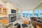 Surf Song, All Oceanfront Living Room with River Rock Fireplace